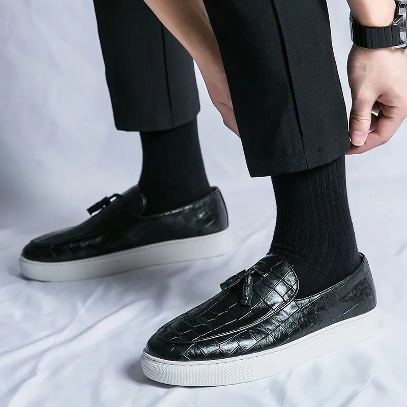 Vestralo Passero black tassel loafers worn with black trousers, elevated everyday look